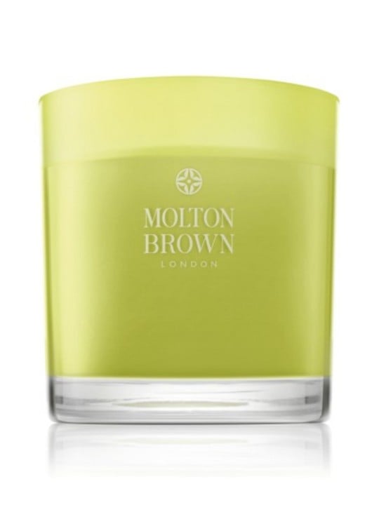 Candela profumata Molton Brown Dewy al mughetto e anice stellato con note floreali legnose e muschiate 480 g.