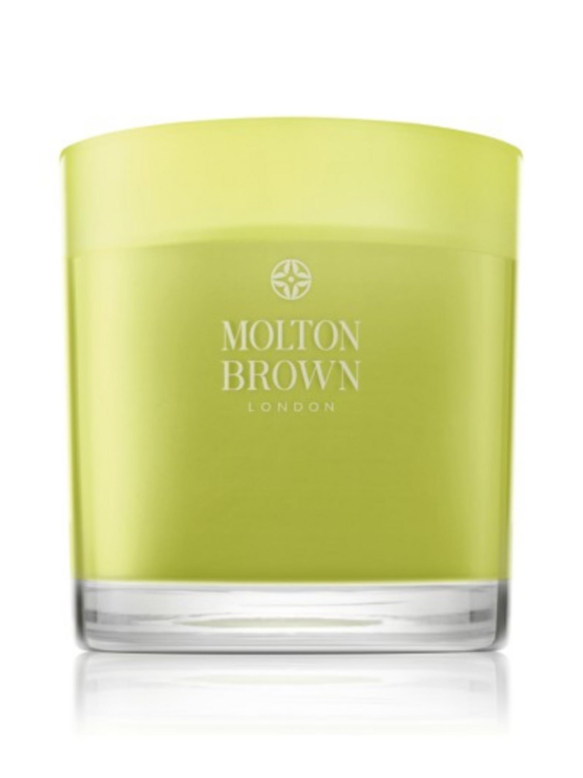 Candela profumata Molton Brown Dewy al mughetto e anice stellato con note floreali legnose e muschiate 480 g.