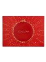 Clarins Aroma Set Tonic Treatment Oil 100 ml   Exfoliating Body Scrub 30 ml   Tonic Hydrating Oil-Balm 30 ml    Large Pouch 15m